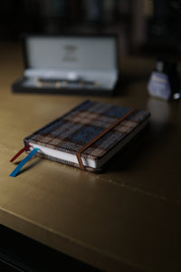 A6 Blank Pocket Notebook — back cover with Fox Brothers authenticity label